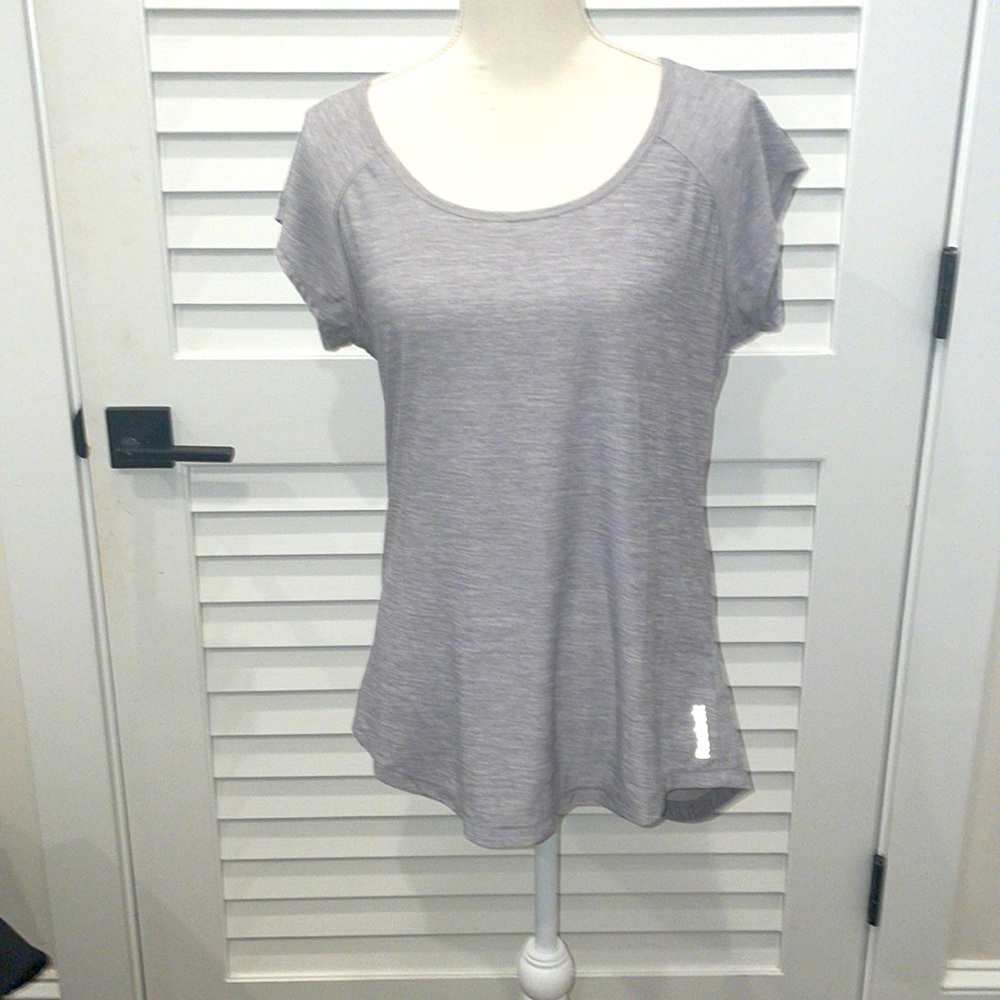 Ladies large Reebok athletic tshirt. Size large with cut out opening in back